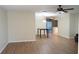 Bright dining area with laminate wood flooring and a charming chandelier at 317 Green Manor Dr # 38 B, Sun City Center, FL 33573