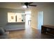 Living room with hardwood floors, a view of kitchen, and office area at 317 Green Manor Dr # 38 B, Sun City Center, FL 33573