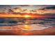 Stunning sunset over the ocean with waves gently lapping the shore at 317 Green Manor Dr # 38 B, Sun City Center, FL 33573