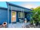 Charming front porch with seating area at 3628 Holiday Lake Dr, Holiday, FL 34691