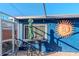 Small patio with table and chairs by the pool at 3628 Holiday Lake Dr, Holiday, FL 34691