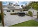 Private backyard with hot tub and patio, nestled beside the house at 414 S Shore Crest Dr, Tampa, FL 33609