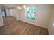 Spacious dining area with wood-look floors and light walls at 414 S Shore Crest Dr, Tampa, FL 33609