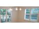 Bright dining room with wood flooring, white walls, and plantation shutters at 414 S Shore Crest Dr, Tampa, FL 33609