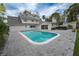 Stunning backyard featuring a clean pool and spacious patio at 414 S Shore Crest Dr, Tampa, FL 33609