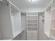 Large walk-in closet with ample shelving and hanging space at 414 S Shore Crest Dr, Tampa, FL 33609