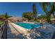 Refreshing community pool with lounge chairs and patio area at 4215 E Bay Dr # 1105C, Clearwater, FL 33764