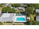 Aerial view of community pool and shuffleboard courts at 4215 E Bay Dr # 1105C, Clearwater, FL 33764