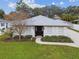 Single-story home with landscaped front yard and driveway at 4307 W San Pedro St, Tampa, FL 33629