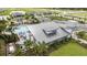 Community clubhouse with pool and surrounding landscape at 5029 124Th E Ave, Parrish, FL 34219
