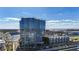 Aerial view of a modern high-rise building with water access at 5120 Marina Way # 2208, Tampa, FL 33611