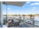 Spacious balcony overlooking marina with seating area and water views at 5120 Marina Way # 2208, Tampa, FL 33611