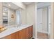 Bathroom with a single sink vanity and a view of another room at 5120 Marina Way # 2208, Tampa, FL 33611