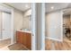 Clean bathroom with wood vanity, vessel sink, and a view of another room at 5120 Marina Way # 2208, Tampa, FL 33611
