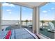 Bedroom with full-wall windows and water views at 5120 Marina Way # 2208, Tampa, FL 33611