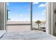 Bedroom with stunning water views from a large window at 5120 Marina Way # 2208, Tampa, FL 33611