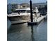 Luxury yacht docked at a private slip in a marina at 5120 Marina Way # 2208, Tampa, FL 33611