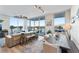 Open concept dining area with stylish table and chairs near the kitchen at 5120 Marina Way # 2208, Tampa, FL 33611