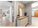 Hallway with light wood floors and access to rooms at 5120 Marina Way # 2208, Tampa, FL 33611