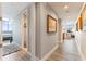 Bright hallway with light wood flooring and access to other rooms at 5120 Marina Way # 2208, Tampa, FL 33611