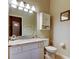 Clean bathroom with granite countertop and updated vanity at 5233 Gato Del Sol Cir, Wesley Chapel, FL 33544