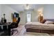 Spacious bedroom with built-in workspace and large window at 5233 Gato Del Sol Cir, Wesley Chapel, FL 33544