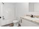 Bathroom with shower, toilet and granite countertop at 5234 Yellow Pine N St, St Petersburg, FL 33709