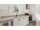 Modern kitchen with stainless steel appliances and granite countertops at 5234 Yellow Pine N St, St Petersburg, FL 33709