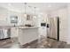 Modern kitchen with stainless steel appliances and an island at 5234 Yellow Pine N St, St Petersburg, FL 33709