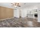 Open concept living room and kitchen with wood-look flooring at 5234 Yellow Pine N St, St Petersburg, FL 33709