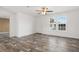 Living room featuring wood-look floors and neutral color palette at 5234 Yellow Pine N St, St Petersburg, FL 33709