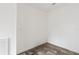Small room with wood-look floors and neutral walls at 5234 Yellow Pine N St, St Petersburg, FL 33709
