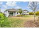 Large backyard with grassy area and privacy fence at 5613 Del Coronado Dr, Apollo Beach, FL 33572