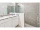 Bathroom with double vanity, large shower, and updated fixtures at 5613 Del Coronado Dr, Apollo Beach, FL 33572