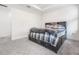 Bright bedroom with grey carpet and built-in headboard at 5613 Del Coronado Dr, Apollo Beach, FL 33572