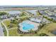Aerial view of community pool and playground with surrounding homes at 5613 Del Coronado Dr, Apollo Beach, FL 33572