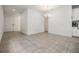 Bright dining area with tile floors and modern chandelier at 5613 Del Coronado Dr, Apollo Beach, FL 33572