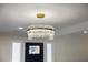 Modern gold and crystal chandelier at 7611 Reindeer Rd, Tampa, FL 33619