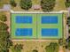 Community tennis courts with four well-maintained courts at 775 Rolling Hills Dr, Palm Harbor, FL 34683