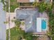 L-shaped home with pool and spacious backyard at 775 Rolling Hills Dr, Palm Harbor, FL 34683