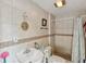 Clean bathroom with shower stall, toilet and sink at 775 Rolling Hills Dr, Palm Harbor, FL 34683