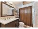 Updated bathroom with vanity, shower, and toilet at 775 Rolling Hills Dr, Palm Harbor, FL 34683