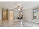 Bedroom with hardwood floors and view of bathroom at 775 Rolling Hills Dr, Palm Harbor, FL 34683