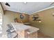 Outdoor bar with seating and sink, adjacent to pool at 775 Rolling Hills Dr, Palm Harbor, FL 34683