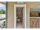 Small bathroom with shower, toilet and sink near pool at 775 Rolling Hills Dr, Palm Harbor, FL 34683