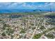 An aerial view of a neighborhood near Venice Island and the Airport showing lush landscaping at 816 Leeward Rd, Venice, FL 34293