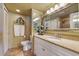 Bathroom with double vanity and granite countertops at 851 Bayway Blvd # 201, Clearwater, FL 33767
