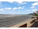 Relaxing beach access with benches, offering scenic bay views at 851 Bayway Blvd # 201, Clearwater, FL 33767