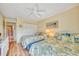 Guest bedroom with two twin beds and ceiling fan at 851 Bayway Blvd # 201, Clearwater, FL 33767