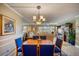 Formal dining room with table and chairs for six at 851 Bayway Blvd # 201, Clearwater, FL 33767
